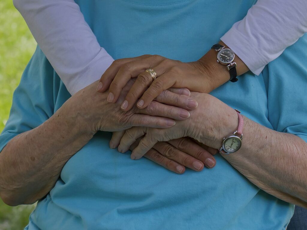 Caregiver helping a senior with daily living activities